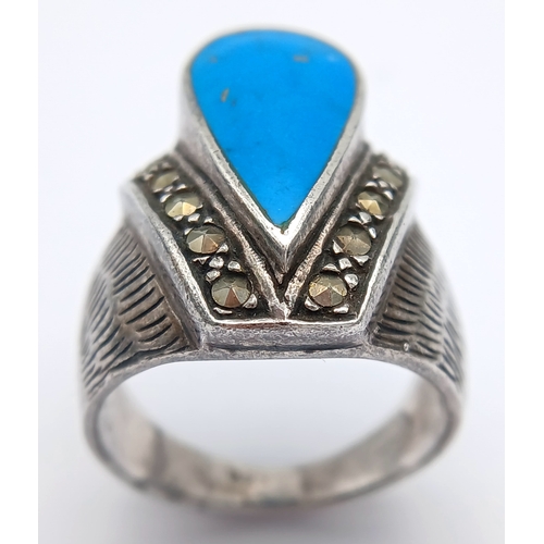 1202 - Vintage SILVER and TURQUOISE RING . Consisting a Large Polished Turquoise Gemstone in a SILVER MARCA... 