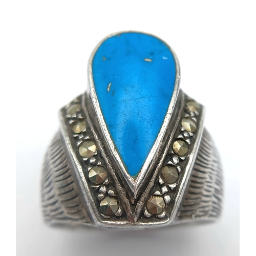 1202 - Vintage SILVER and TURQUOISE RING . Consisting a Large Polished Turquoise Gemstone in a SILVER MARCA... 