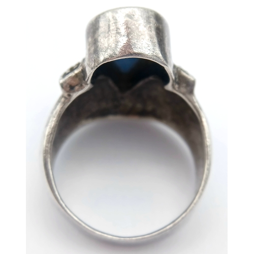 1202 - Vintage SILVER and TURQUOISE RING . Consisting a Large Polished Turquoise Gemstone in a SILVER MARCA... 