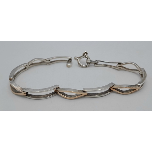 1175 - An 18k Yellow Gold plated on 950 Silver Modernist Design Bracelet- 20cm Length.
5.5mm Wide, the Brac... 