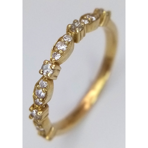 1207 - A 9K Yellow Gold and Diamond Half Eternity Ring. Size L 1/2. 1.44g. Ref: 4.3