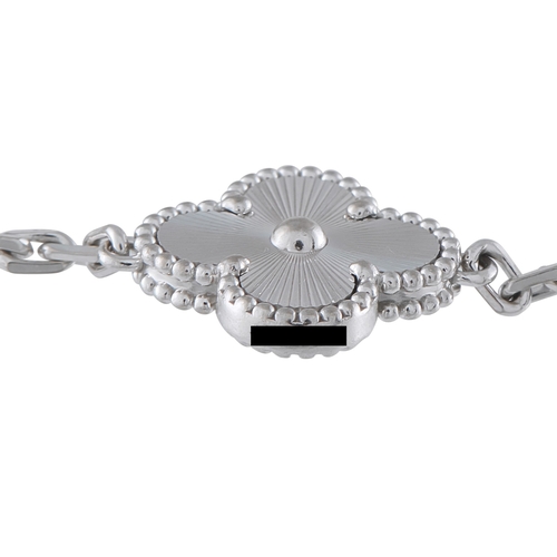 555 - A Van Cleef & Arpels Vintage AlhambrAn 18K White Gold Bracelet. The brands iconic clover-shaped moti... 