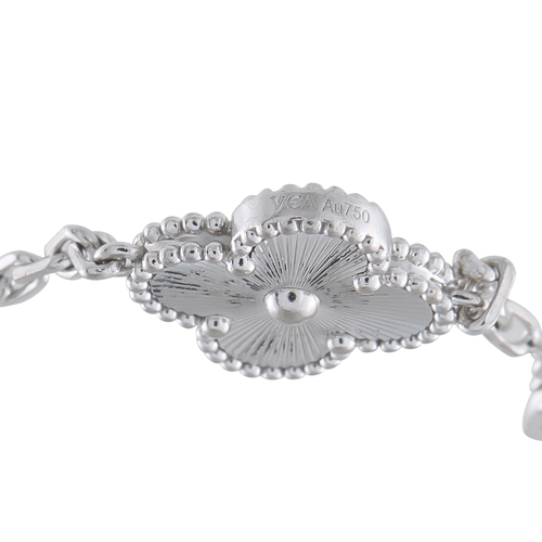 555 - A Van Cleef & Arpels Vintage AlhambrAn 18K White Gold Bracelet. The brands iconic clover-shaped moti... 