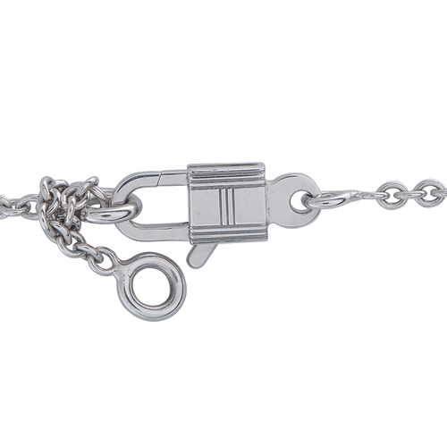 422 - A Hermes Amulettes Birkin 18K White Gold Diamond Pendant Necklace. A Birkin pendant takes center sta... 