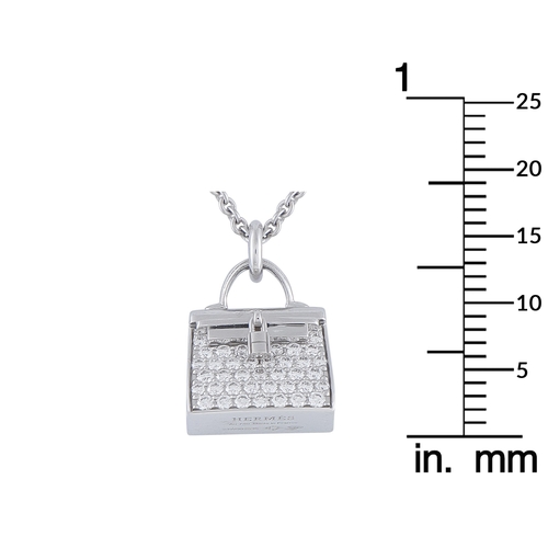 422 - A Hermes Amulettes Birkin 18K White Gold Diamond Pendant Necklace. A Birkin pendant takes center sta... 