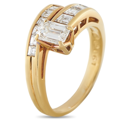 1172 - An 18K Yellow Gold 1.28ct Diamond Ring. A stunning wrapped setting, it features a 0.61 Diamond cente... 