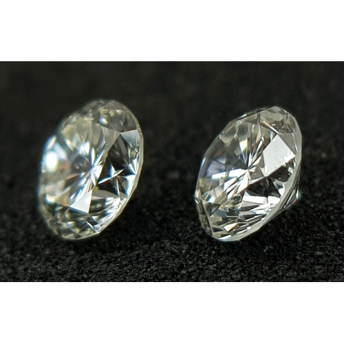 516 - A PAIR OF, NATURAL ROUND BRILLIANT CUT DIAMONDS. 0.37CT WEIGHT. ABSC 2002