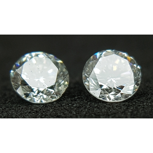 516 - A PAIR OF, NATURAL ROUND BRILLIANT CUT DIAMONDS. 0.37CT WEIGHT. ABSC 2002