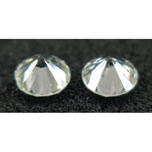 516 - A PAIR OF, NATURAL ROUND BRILLIANT CUT DIAMONDS. 0.37CT WEIGHT. ABSC 2002