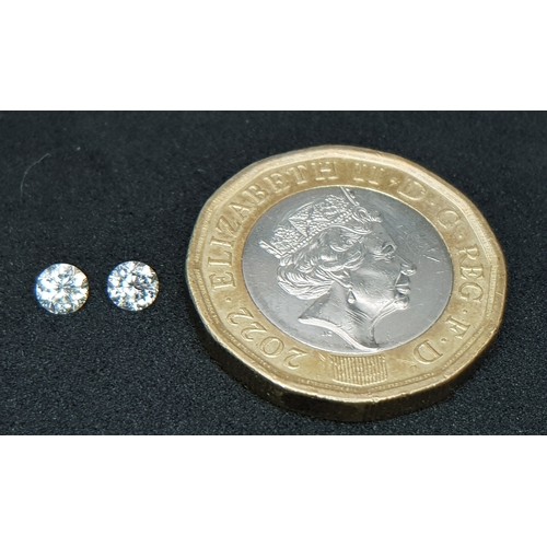 516 - A PAIR OF, NATURAL ROUND BRILLIANT CUT DIAMONDS. 0.37CT WEIGHT. ABSC 2002