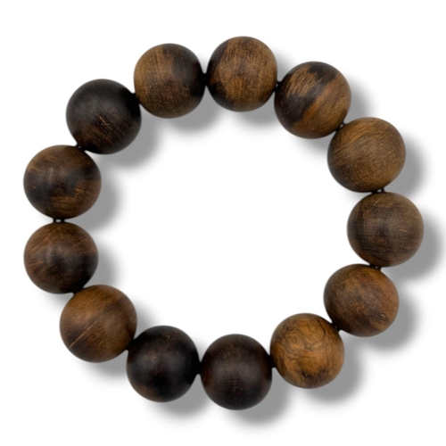 1166 - A vintage Natural Agarwood round Bead Bracelet. 
The natural agarwood fragrance is well known for it... 