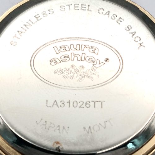 1064 - A PAIR OF LADIES WRISTWATCHES. A RED HERRING, ROSE GOLD TONE, MESH BRACELET WATCH AND A LAURA ASHLEY... 