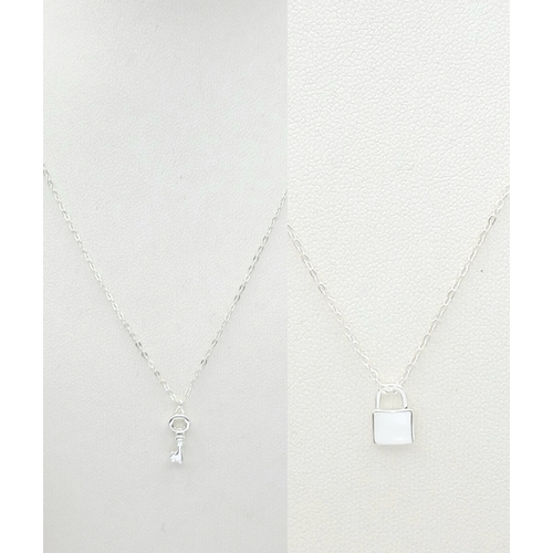 1155 - A STERLING SILVER PADLOCK PENDANT ON CHAIN ALONG WITH ANOTHER STERLING SILVER KEY PENDANT ON CHAIN. ... 