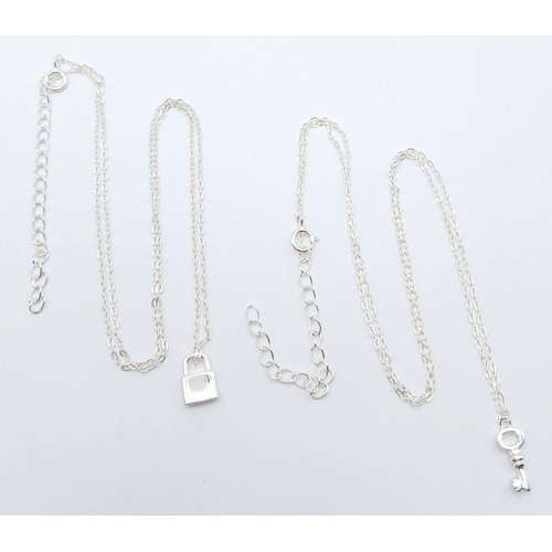 1155 - A STERLING SILVER PADLOCK PENDANT ON CHAIN ALONG WITH ANOTHER STERLING SILVER KEY PENDANT ON CHAIN. ... 