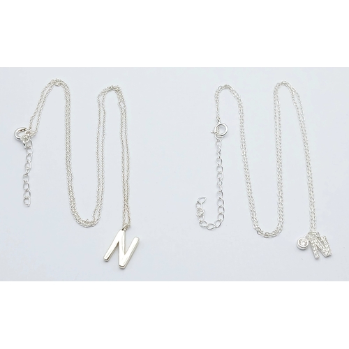 1196 - A PAIR OF STERLING SILVER NECKLACES WITH INITIAL N PENDANTS. ONE IS STONE SET. TOTAL WEIGHT 2.7G. A/... 