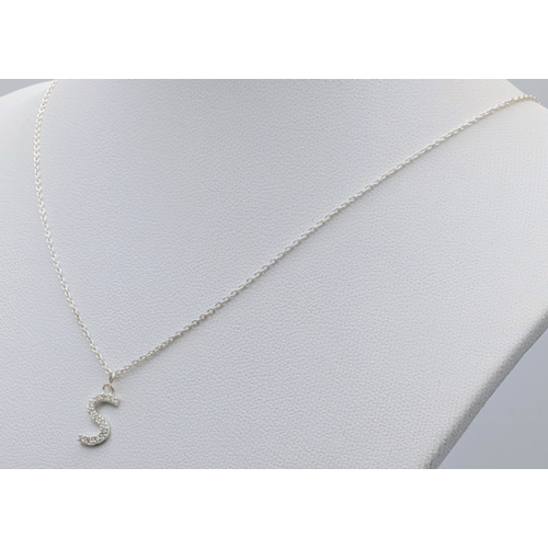 1210 - A PAIR OF STERLING SILVER NECKLACES WITH INITIAL S PENDANTS. ONE IS STONE SET. TOTAL WEIGHT 2.9G. A/... 