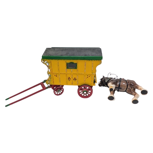 1876 - A vintage hand made, wooden Gypsy caravan with a china horse. A lovely item with great detail.