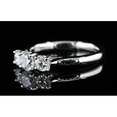 160 - An 18K Yellow and White Gold Three Stone Graduated Diamond Ring. 0.50ctw. Size M. 3g total weight. R... 