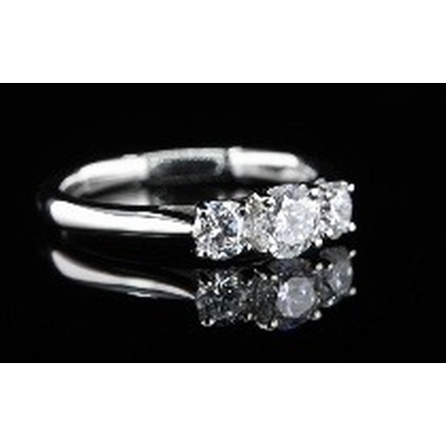 160 - An 18K Yellow and White Gold Three Stone Graduated Diamond Ring. 0.50ctw. Size M. 3g total weight. R... 