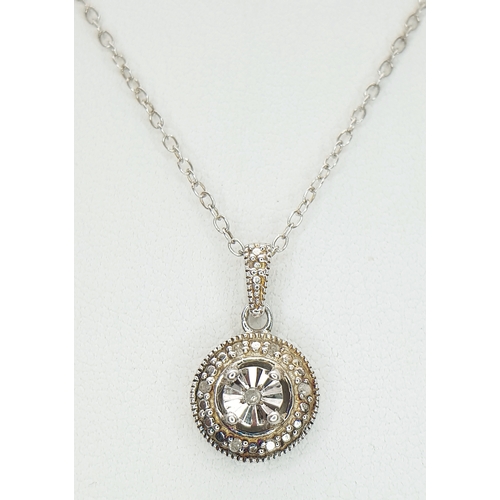 169 - A 925 Sterling Silver Necklace with Round Crystal Set Pendant. Approx 46cm length, pendant drop 1.5c... 