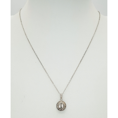 169 - A 925 Sterling Silver Necklace with Round Crystal Set Pendant. Approx 46cm length, pendant drop 1.5c... 