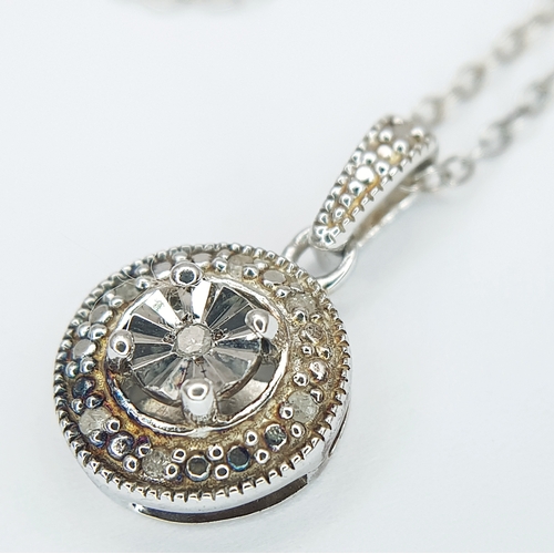 169 - A 925 Sterling Silver Necklace with Round Crystal Set Pendant. Approx 46cm length, pendant drop 1.5c... 