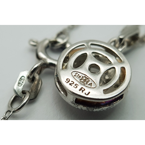169 - A 925 Sterling Silver Necklace with Round Crystal Set Pendant. Approx 46cm length, pendant drop 1.5c... 