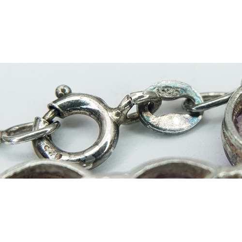 148 - A 925 Sterling Silver Necklace with Amethyst Cross Pendant. Approx 40cm length, pendant drop 3.5cm. ... 