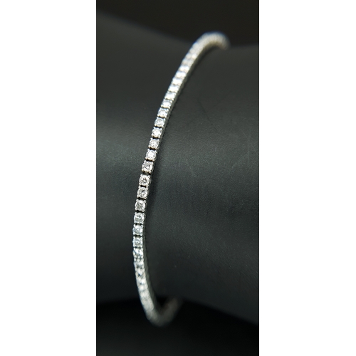 123 - A Platinum Lab-Grown Diamond Tennis Bracelet. 1.50ct Total Weight of Diamonds, Approximate Length 18... 