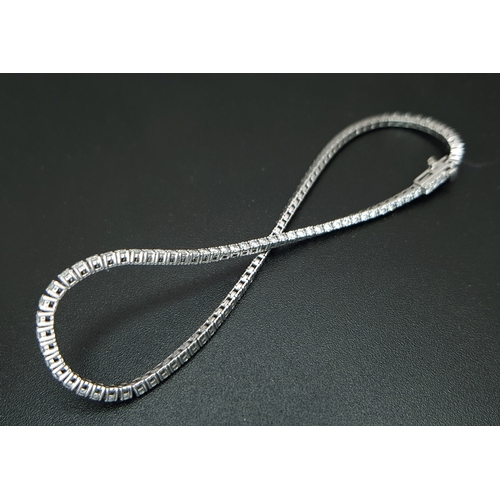 123 - A Platinum Lab-Grown Diamond Tennis Bracelet. 1.50ct Total Weight of Diamonds, Approximate Length 18... 