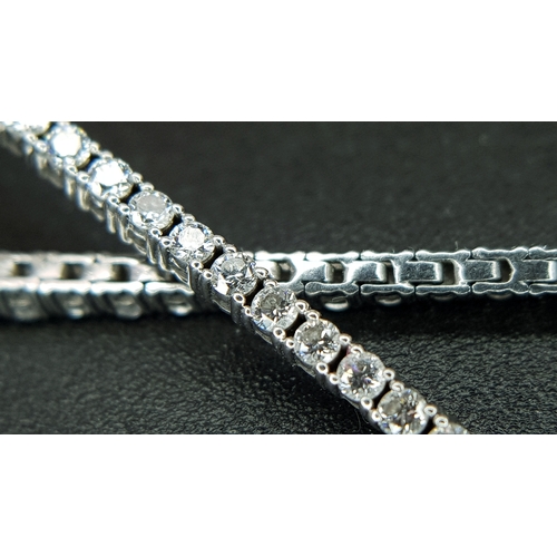 123 - A Platinum Lab-Grown Diamond Tennis Bracelet. 1.50ct Total Weight of Diamonds, Approximate Length 18... 