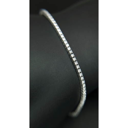 123 - A Platinum Lab-Grown Diamond Tennis Bracelet. 1.50ct Total Weight of Diamonds, Approximate Length 18... 