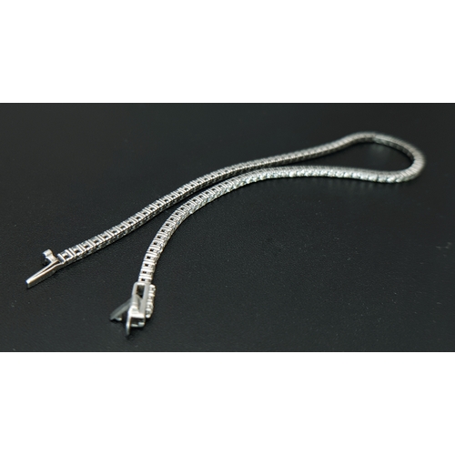 123 - A Platinum Lab-Grown Diamond Tennis Bracelet. 1.50ct Total Weight of Diamonds, Approximate Length 18... 