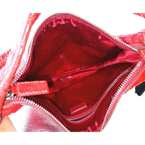 124 - A Red Prada Ostrich Effect Leather Crossbody Bag. Red ostrich effect leather exterior with silver-to... 