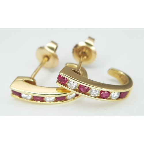 125 - A PAIR OF 18K YELLOW GOLD, DIAMOND AND RUBY SET DROP EARRINGS. TOTAL WEIGHT 3.4G. TAN 9003