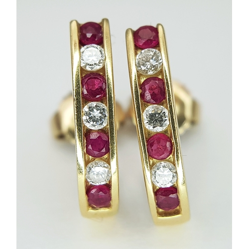 125 - A PAIR OF 18K YELLOW GOLD, DIAMOND AND RUBY SET DROP EARRINGS. TOTAL WEIGHT 3.4G. TAN 9003