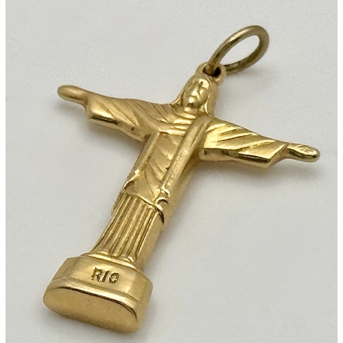 143 - An 18K Yellow Gold (tests as) Christ the Redeemer Pendant. 3.5cm. 3.15g.