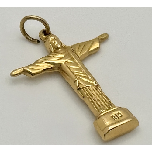 143 - An 18K Yellow Gold (tests as) Christ the Redeemer Pendant. 3.5cm. 3.15g.