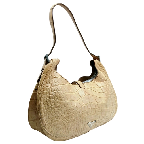 145 - A Prada Croc-Embossed Leather Shoulder Bag. Beige leather exterior with silver-tone Prada logo plaqu... 