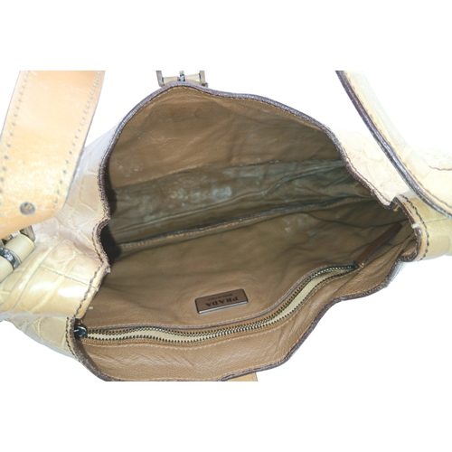 145 - A Prada Croc-Embossed Leather Shoulder Bag. Beige leather exterior with silver-tone Prada logo plaqu... 