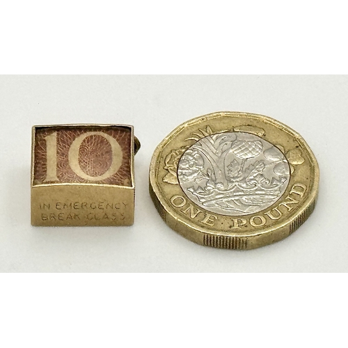 154 - Vintage 9 CARAT GOLD,  TEN SHILLING NOTE, GOLD CASED CHARM. Full UK hallmark. 2.7 Grams Gross.