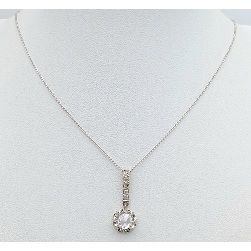 156 - An 18K White Gold and White Stone Pendant on an 18K White Gold Chain. 2.5cm and 40cm. 2.75g. Ref: 1.... 