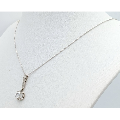 156 - An 18K White Gold and White Stone Pendant on an 18K White Gold Chain. 2.5cm and 40cm. 2.75g. Ref: 1.... 