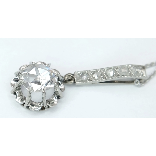 156 - An 18K White Gold and White Stone Pendant on an 18K White Gold Chain. 2.5cm and 40cm. 2.75g. Ref: 1.... 