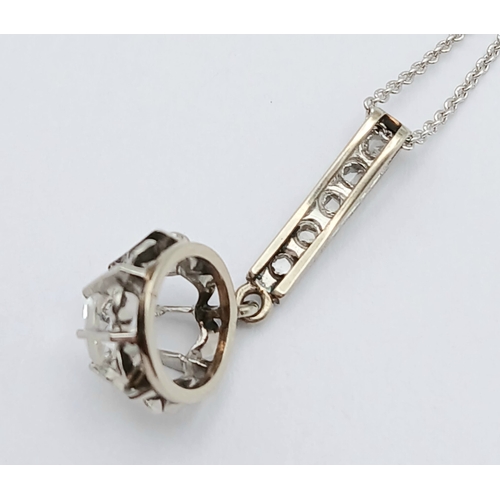 156 - An 18K White Gold and White Stone Pendant on an 18K White Gold Chain. 2.5cm and 40cm. 2.75g. Ref: 1.... 
