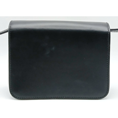 159 - A Burberry Black Leather TB Crossbody Bag. Smooth black leather exterior with gold-tone hardware, ad... 