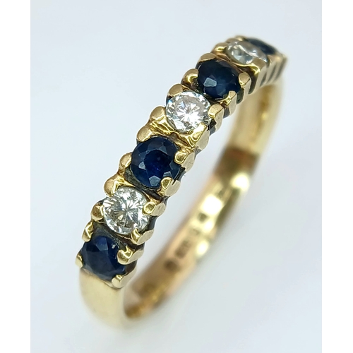 161 - Classic 18 CARAT GOLD, SAPPHIRE and DIAMOND, 7 STONE RING. Full UK hallmark. 3.35 Grams. Size L 1/2 ... 
