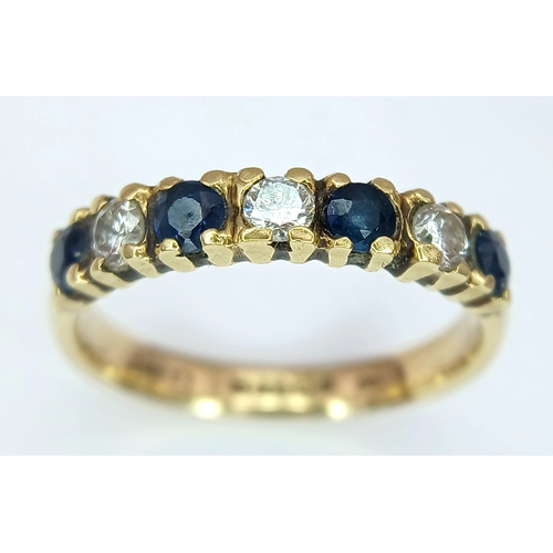161 - Classic 18 CARAT GOLD, SAPPHIRE and DIAMOND, 7 STONE RING. Full UK hallmark. 3.35 Grams. Size L 1/2 ... 
