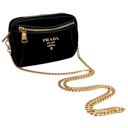 173 - A Prada Black Velvet Chain Shoulder Bag. Black velvet exterior with smooth black leather trim, gold-... 