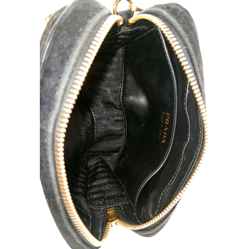 173 - A Prada Black Velvet Chain Shoulder Bag. Black velvet exterior with smooth black leather trim, gold-... 